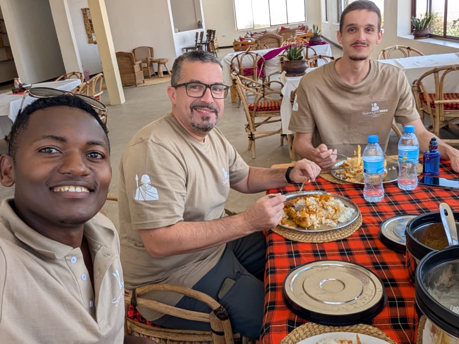 Guests sharing a meal during their safari